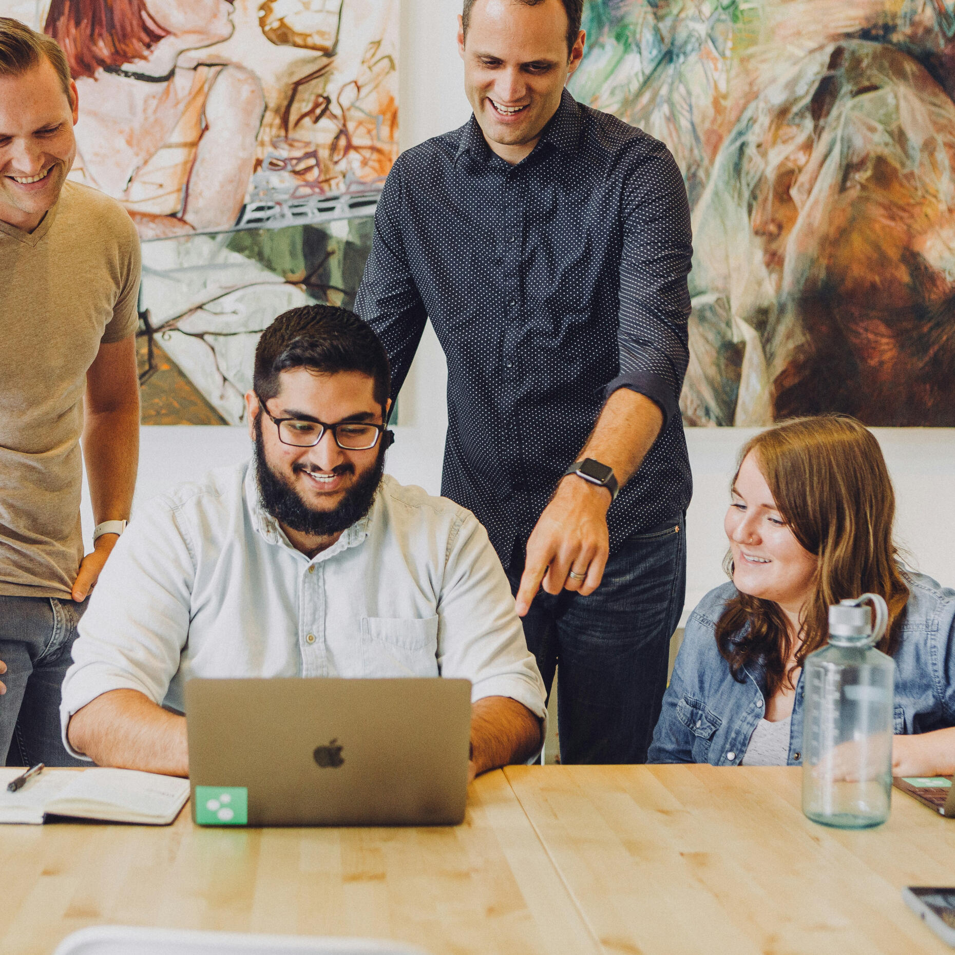 A woman sitting looking bored